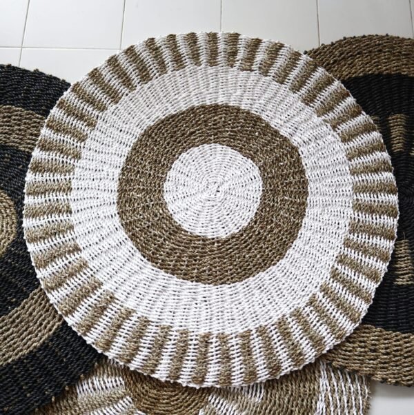 White and tan Sun round seagrass rug, 1 m